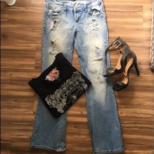 Distressed faded flare jeans